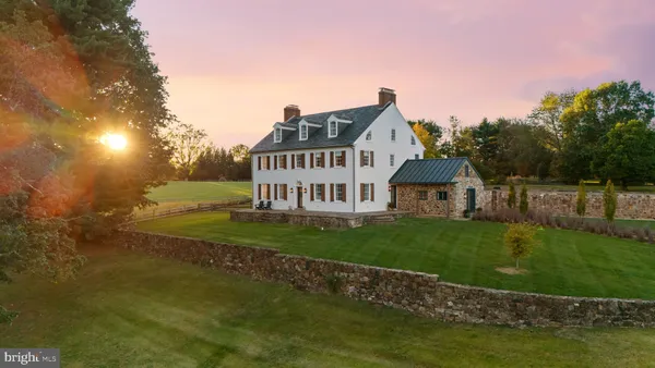 a view of a house with a big yard