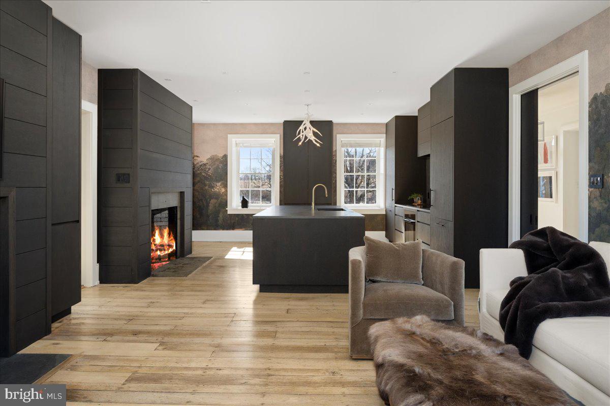 864 Grubbs Mill Road Newtown Square, PA 19073 - Photo 16 of 50 a living room with furniture and a fireplace