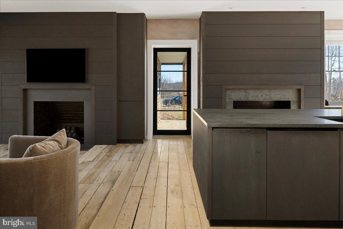 864 Grubbs Mill Road Newtown Square, PA 19073 - Photo 19 of 50 a living room with furniture and a fireplace