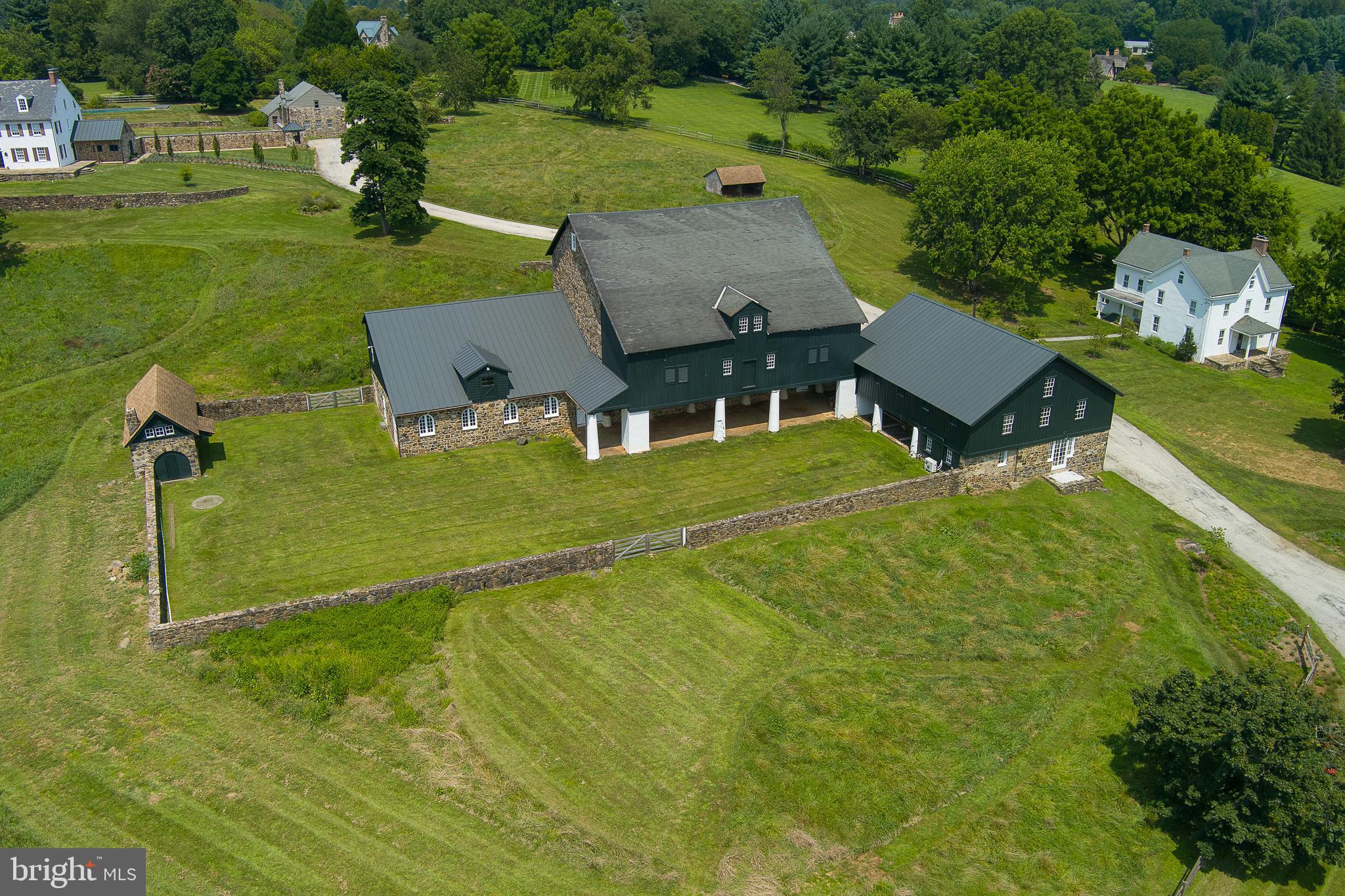 864 Grubbs Mill Road Newtown Square, PA 19073 - Photo 33 of 50 an aerial view of a house with swimming pool garden and patio