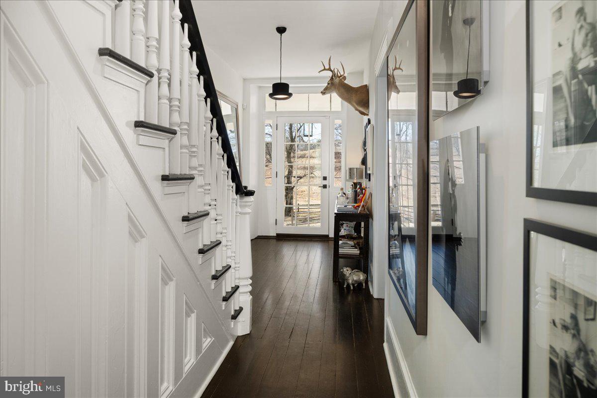 864 Grubbs Mill Road Newtown Square, PA 19073 - Photo 34 of 48 a view of entryway and hall with wooden floor