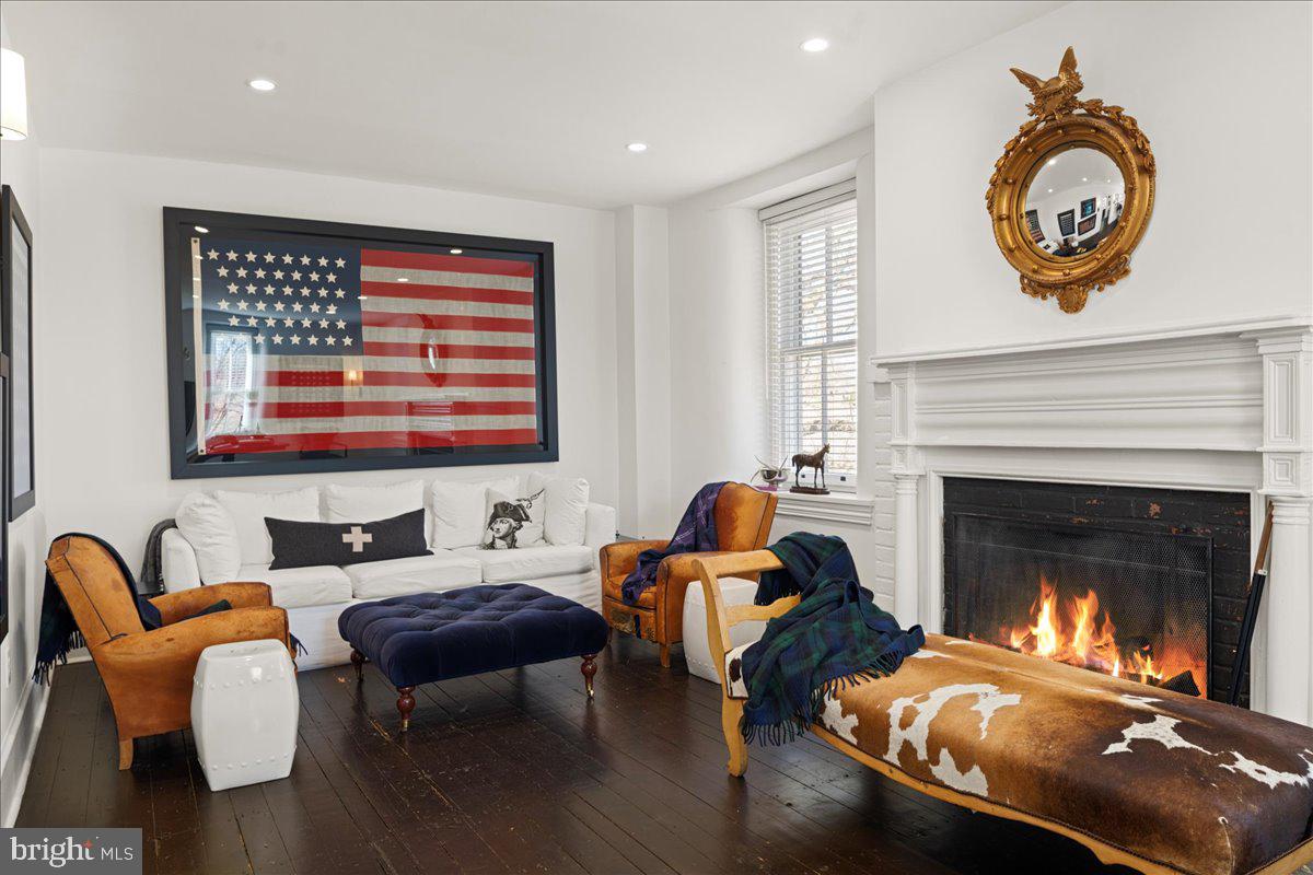 864 Grubbs Mill Road Newtown Square, PA 19073 - Photo 38 of 50 a living room with furniture and a fireplace