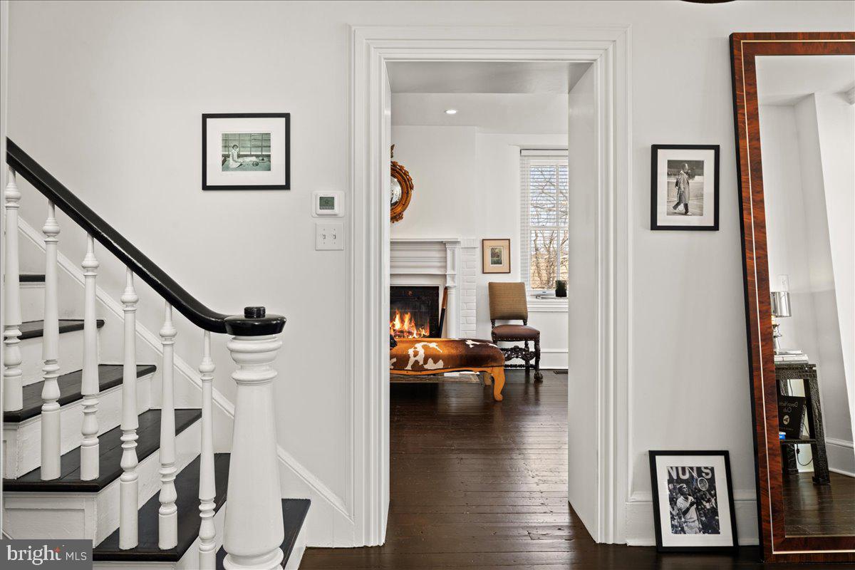864 Grubbs Mill Road Newtown Square, PA 19073 - Photo 38 of 48 a living room with furniture and wooden floor