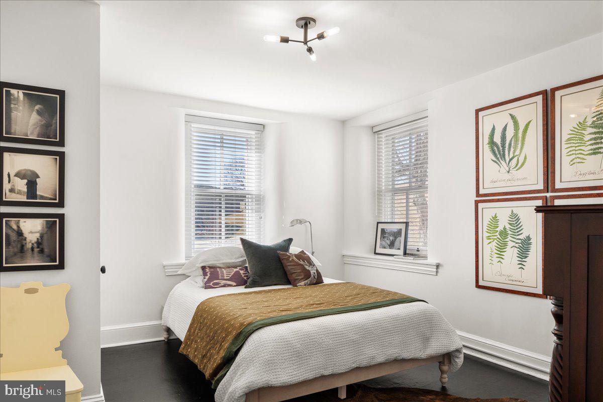 864 Grubbs Mill Road Newtown Square, PA 19073 - Photo 42 of 48 a bedroom with a large bed and a window