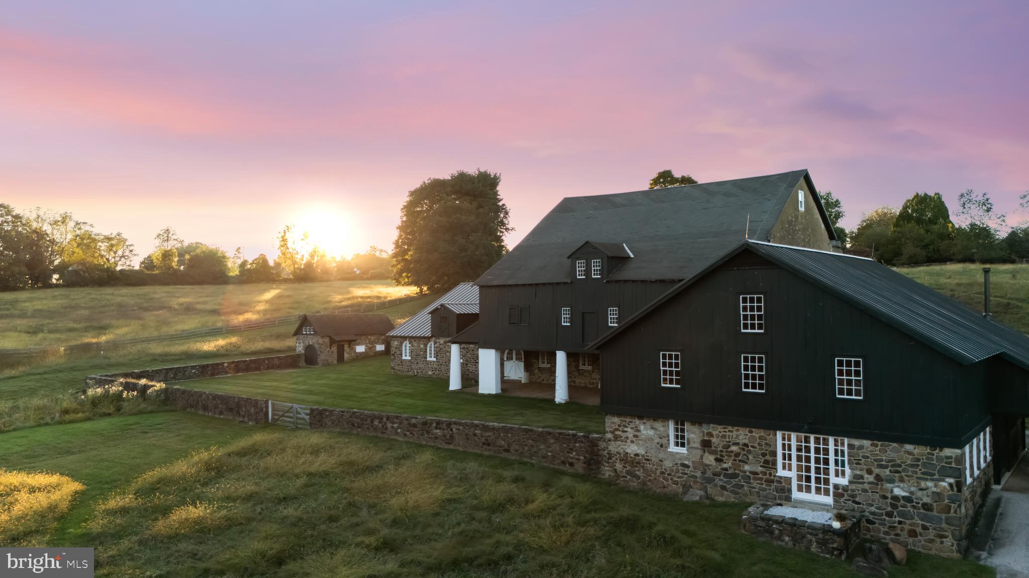 864 Grubbs Mill Road Newtown Square, PA 19073 - Photo 45 of 48 a front view of a house with a yard