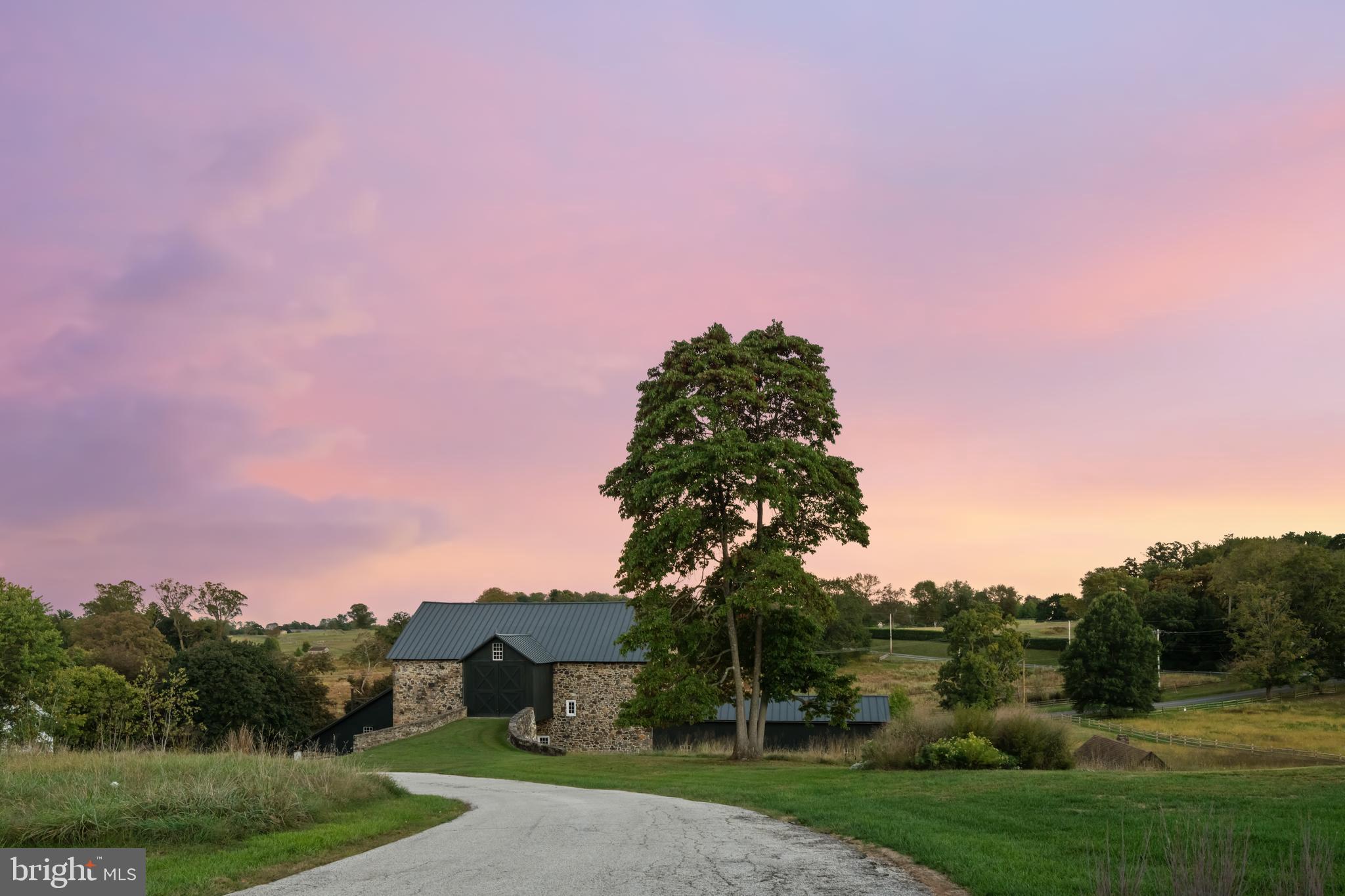 864 Grubbs Mill Road Newtown Square, PA 19073 - Photo 48 of 50 a view of a field with a tree in the background