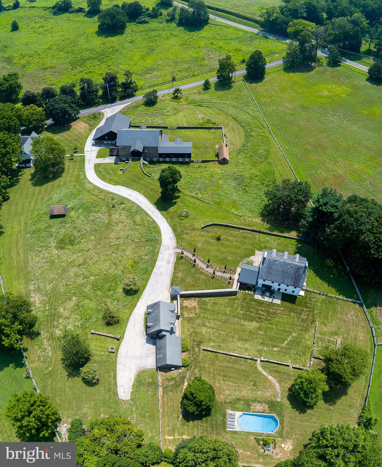 864 Grubbs Mill Road Newtown Square, PA 19073 - Photo 49 of 50 a view of a swimming pool with a yard