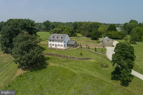a view of a golf course with a house