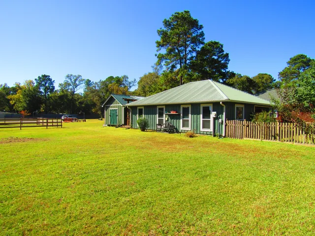a front view of a house with swimming pool