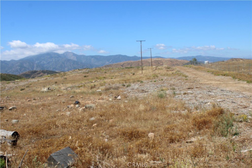 0 Candy Lane Perris, CA 92570 - Photo 21 of 23 a view of a large mountain with a mountain in the background