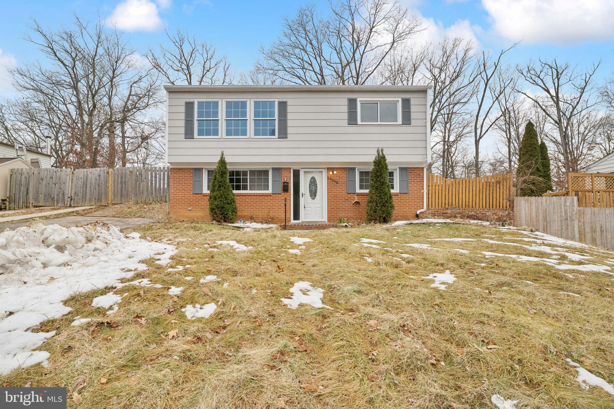 14508 Fullerton Road Woodbridge, VA 22193 - Photo 1 of 28 a view of a yard with a house