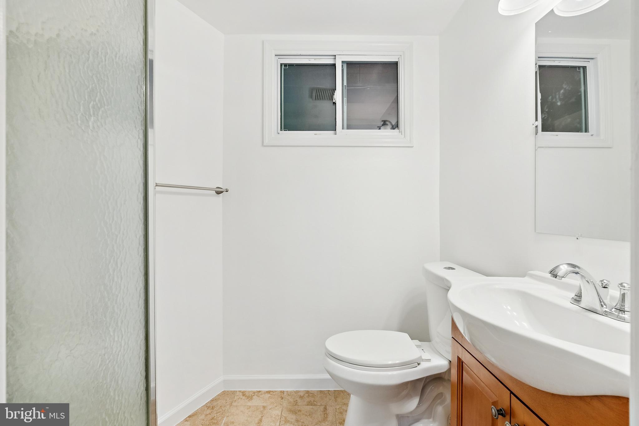 14508 Fullerton Road Woodbridge, VA 22193 - Photo 12 of 28 a bathroom with a sink and a toilet