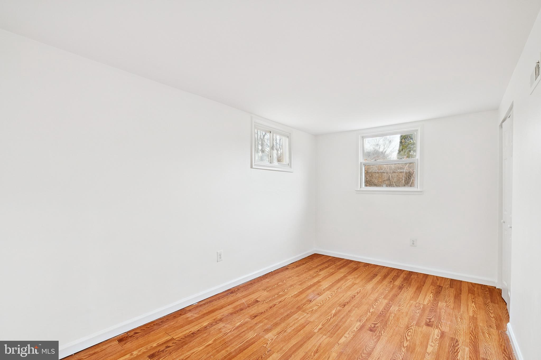 14508 Fullerton Road Woodbridge, VA 22193 - Photo 13 of 28 a view of empty room with wooden floor