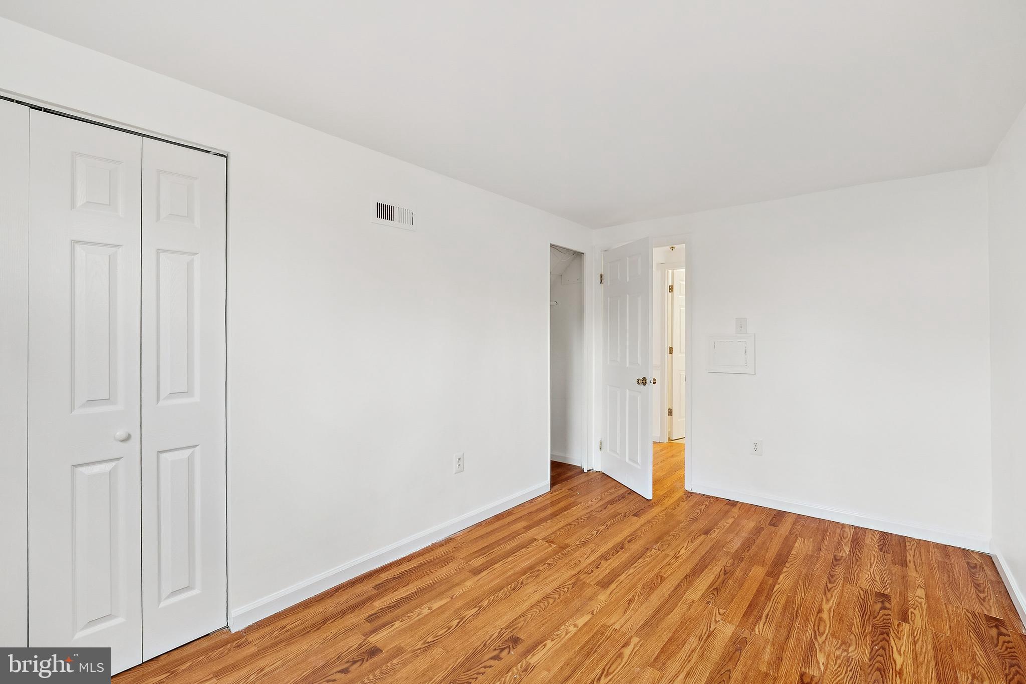 14508 Fullerton Road Woodbridge, VA 22193 - Photo 14 of 28 a view of empty room with wooden floor