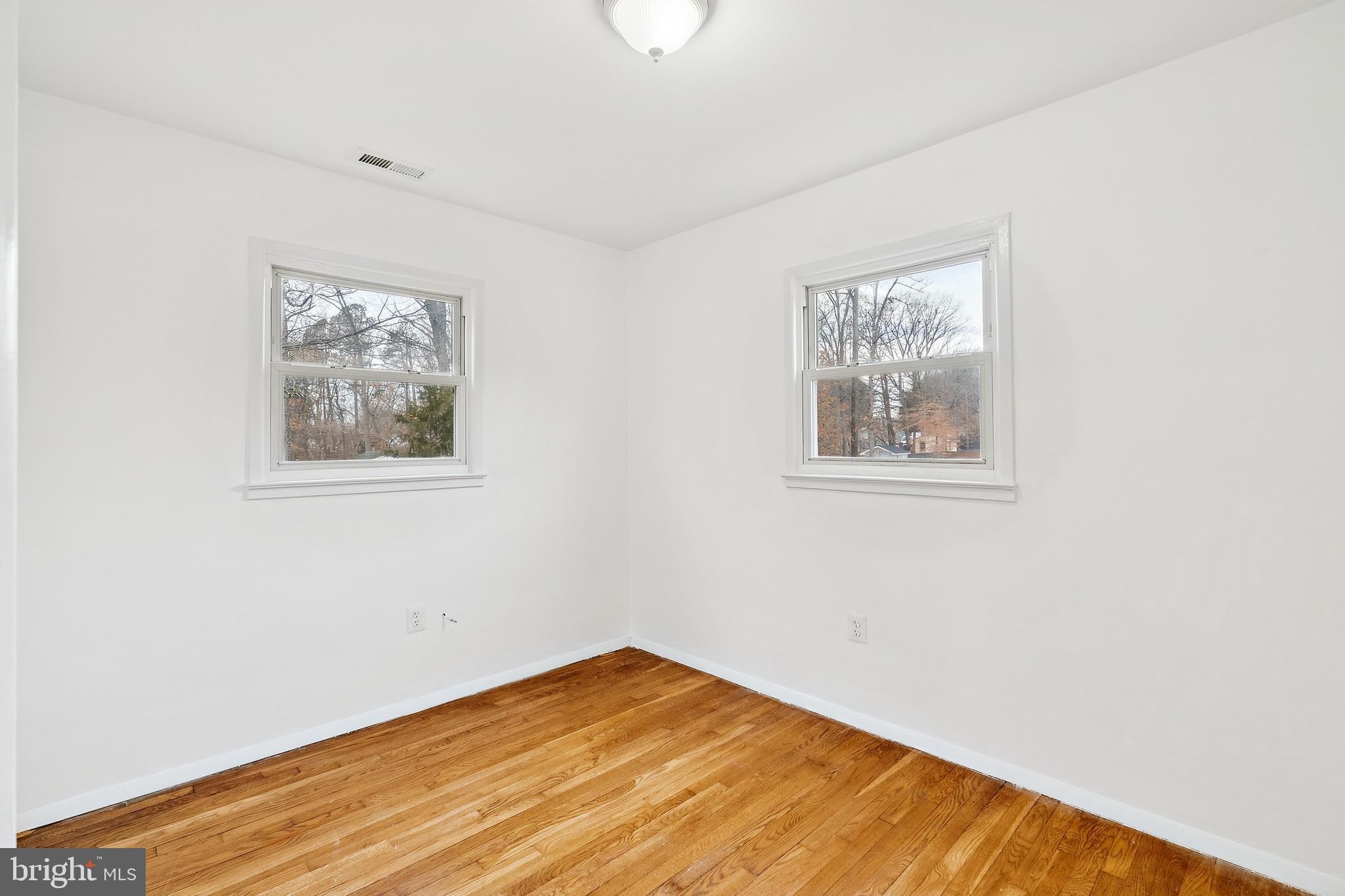 14508 Fullerton Road Woodbridge, VA 22193 - Photo 15 of 28 a view of empty room with wooden floor