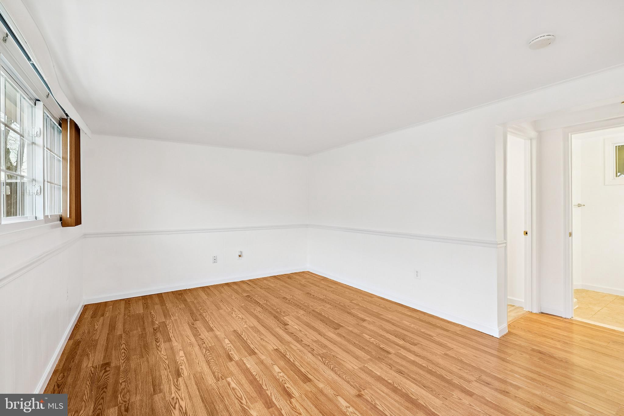 14508 Fullerton Road Woodbridge, VA 22193 - Photo 2 of 28 a view of empty room with wooden floor