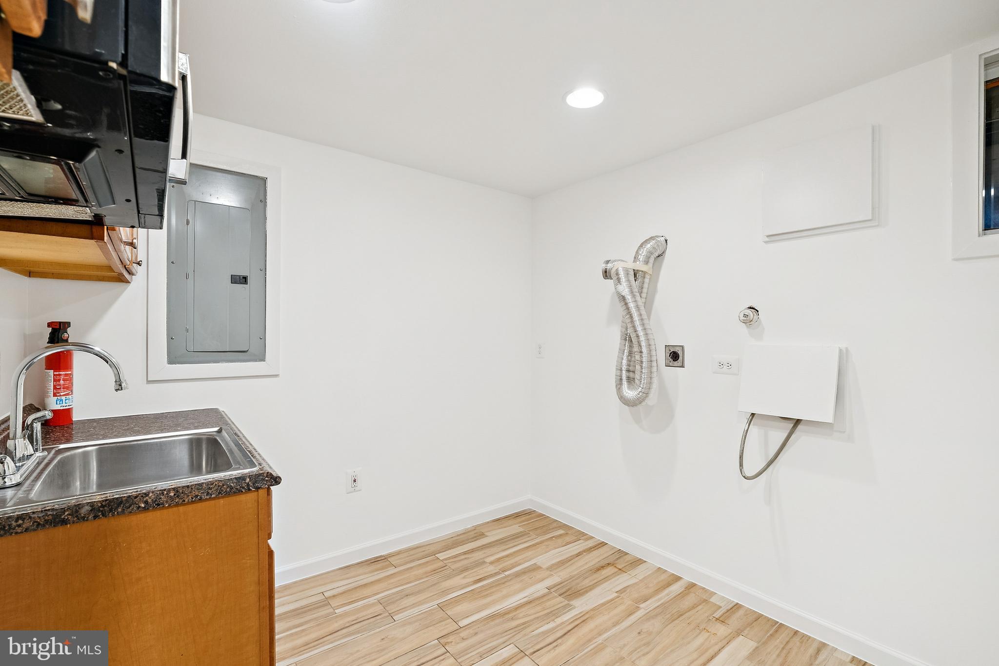 14508 Fullerton Road Woodbridge, VA 22193 - Photo 21 of 28 a bathroom with a sink and mirror