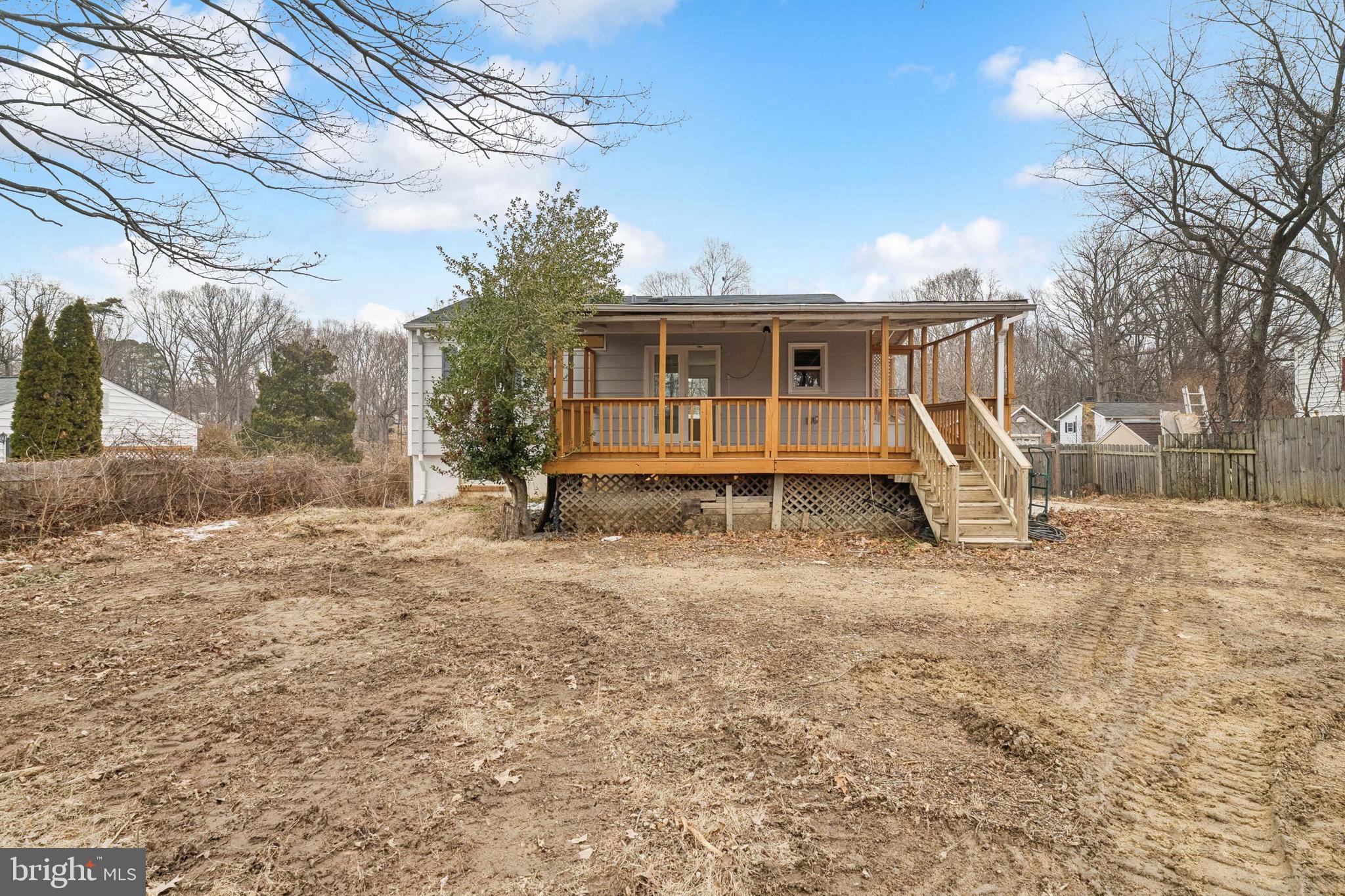 14508 Fullerton Road Woodbridge, VA 22193 - Photo 25 of 28 a view of a house with a yard