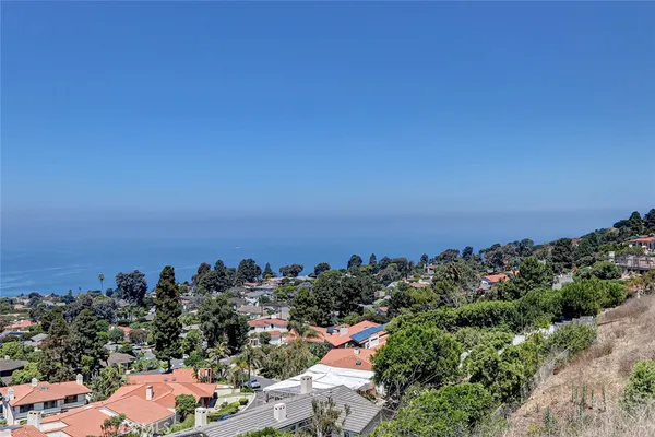 an aerial view of multiple house with outdoor space