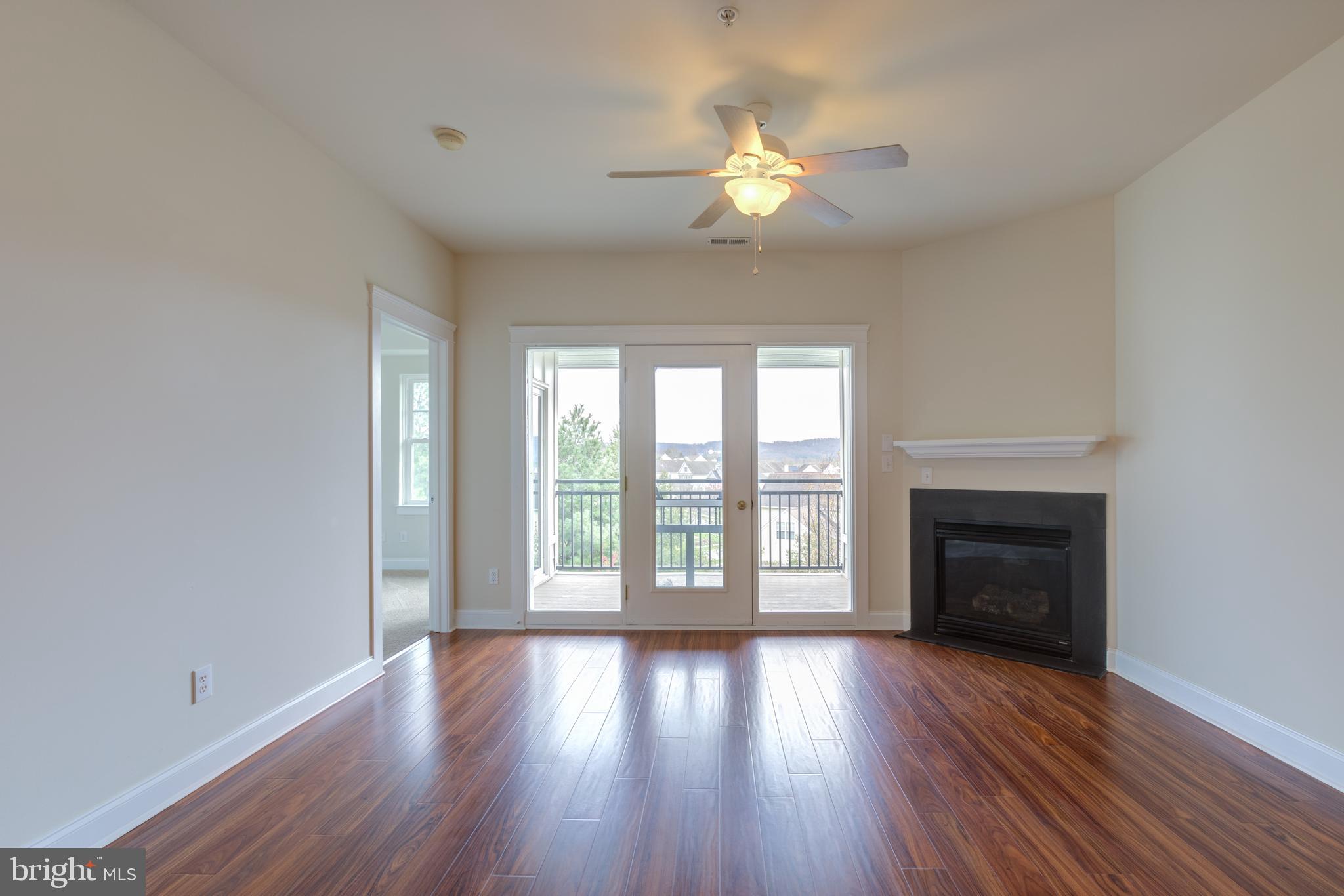 186 Bucktown Xing Road, Unit 43B Pottstown, PA 19465 - Photo 21 of 38 Living area has doors to private deck
