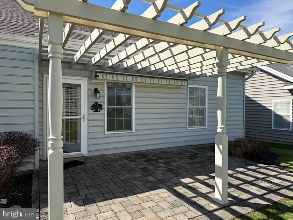 a front view of a house with a large windows