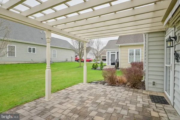 a house view with a backyard space
