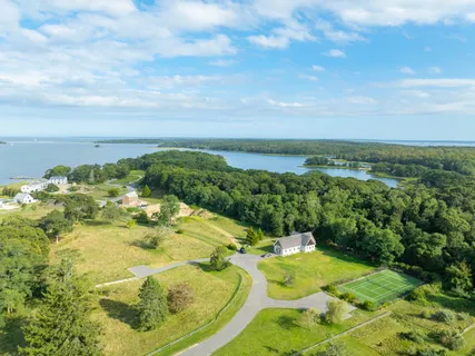 a view of a swimming pool with a yard