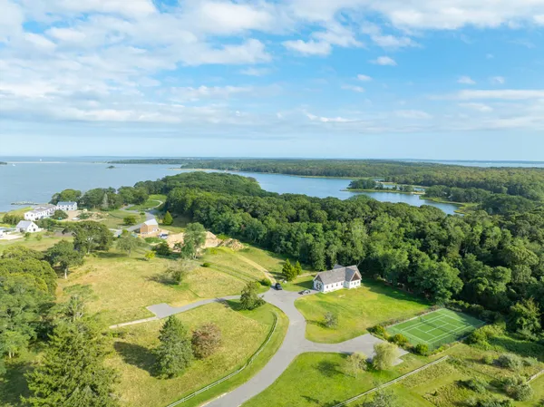 a view of a swimming pool with a yard
