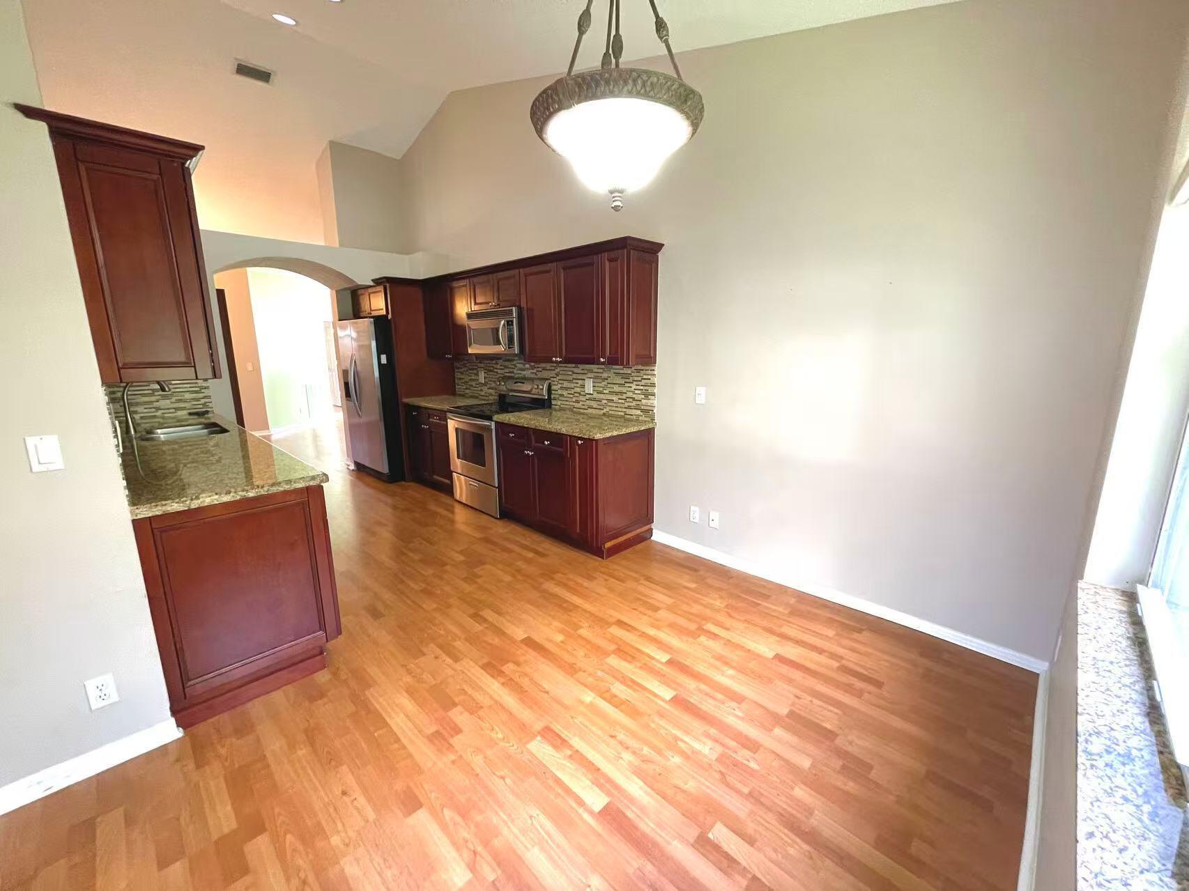 8550 Vía Romana, Unit 2 Boca Raton, FL 33496 - Photo 11 of 28 a view of kitchen and sink