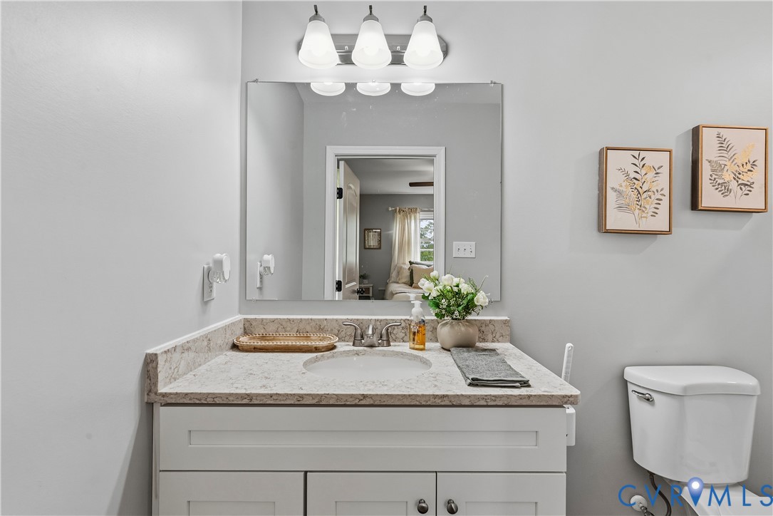 81 Rock Creek Road Cumberland, VA 23040 - Photo 17 of 45 a bathroom with a sink vanity and toilet