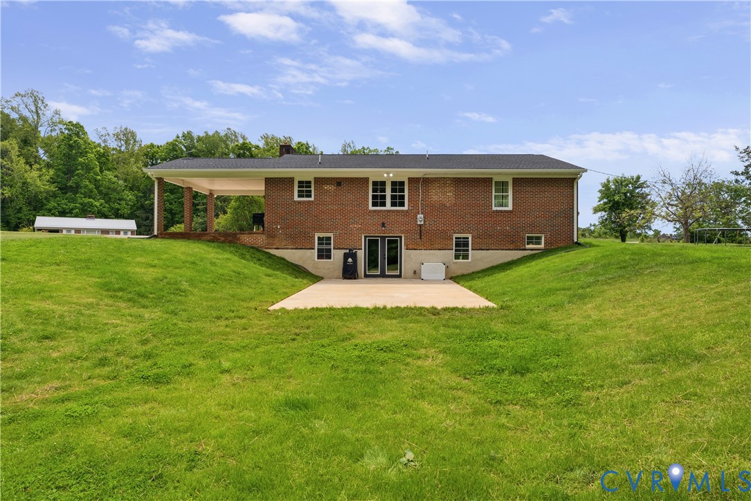 81 Rock Creek Road Cumberland, VA 23040 - Photo 36 of 45 a front view of house with yard and trees