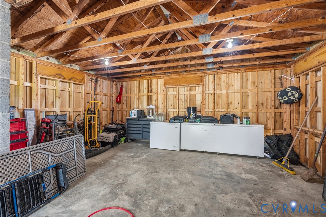81 Rock Creek Road Cumberland, VA 23040 - Photo 41 of 45 a view of a room with wooden floor and furniture