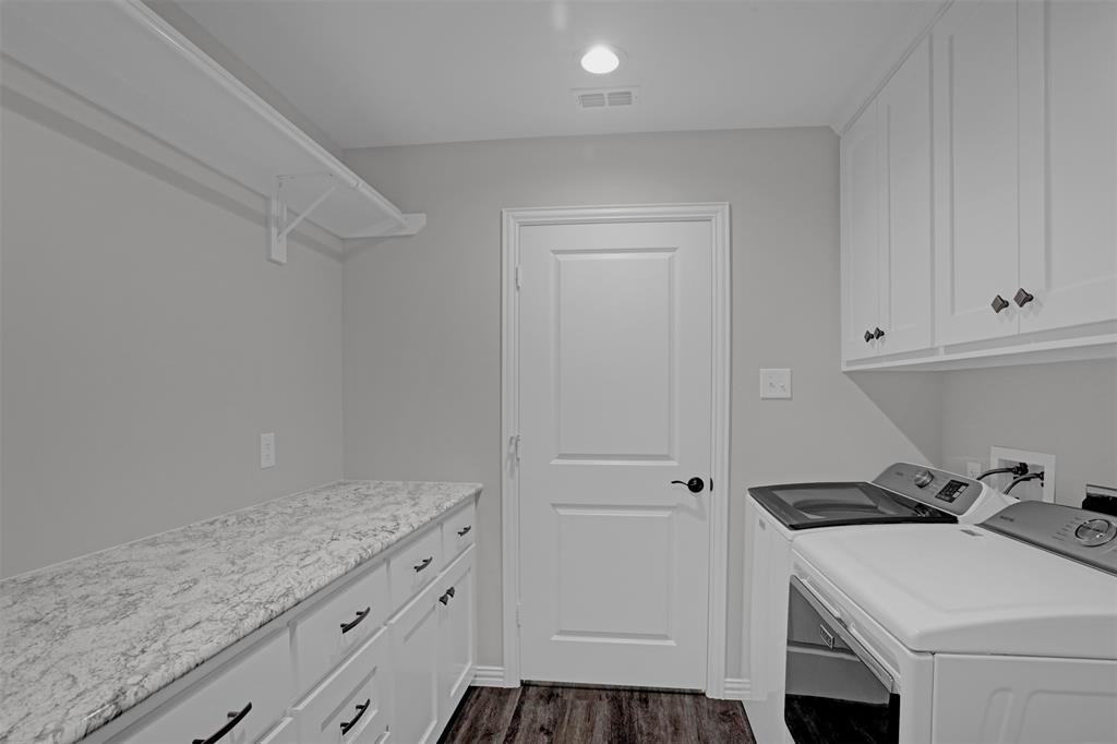 399 South Main Street Blue Ridge, TX 75424 - Photo 19 of 25 a kitchen with granite countertop white cabinets and white appliances