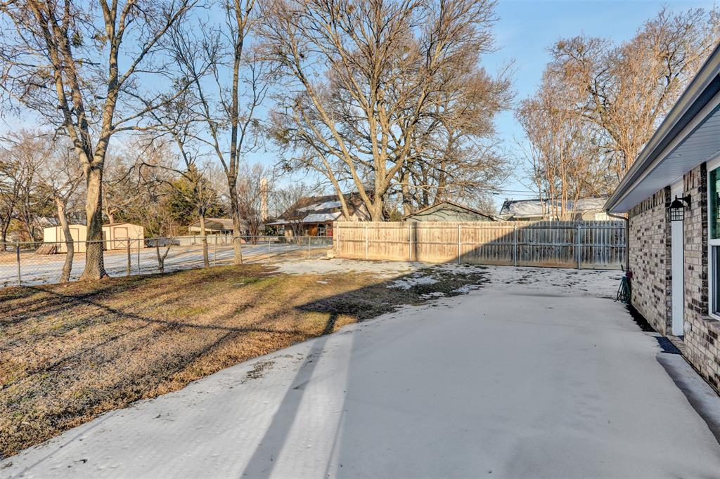 399 South Main Street Blue Ridge, TX 75424 - Photo 20 of 25 a view of a yard with snow on the road