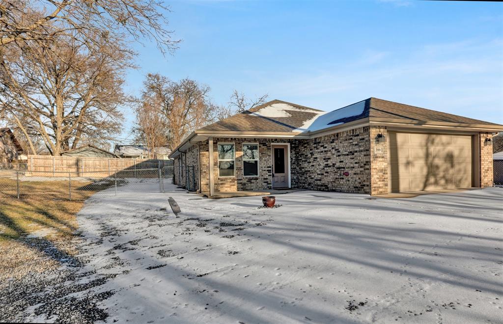 399 South Main Street Blue Ridge, TX 75424 - Photo 22 of 25 a view of a house with backyard and porch
