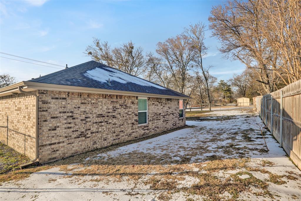 399 South Main Street Blue Ridge, TX 75424 - Photo 24 of 25 a view of a yard with wooden fence