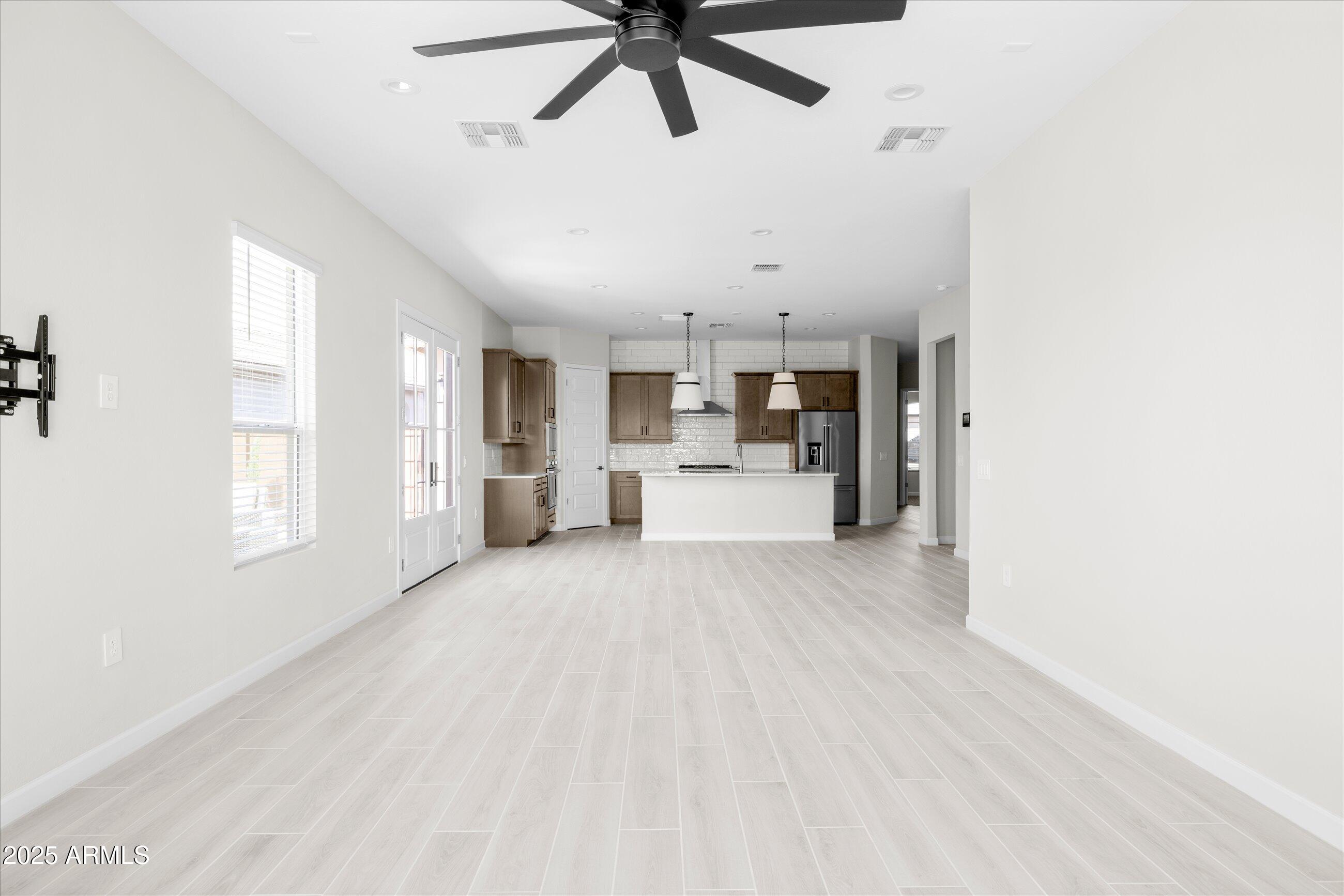 21425 North 59th Street Phoenix, AZ 85054 - Photo 16 of 47 a view of a kitchen with furniture and windows