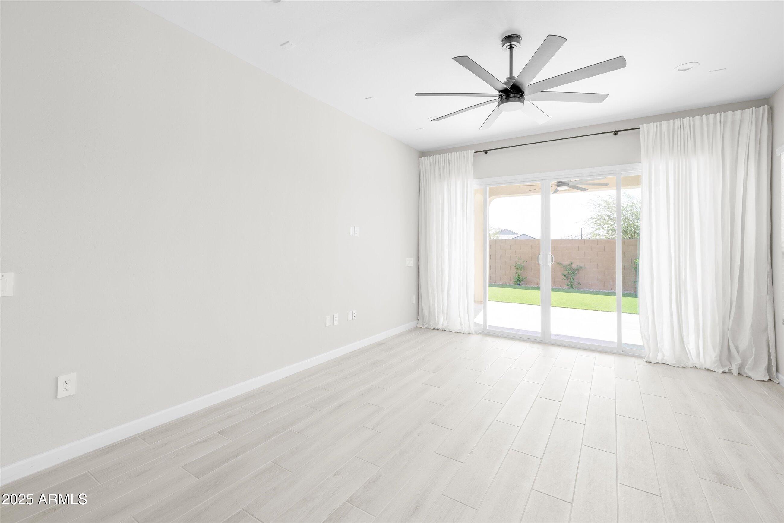 21425 North 59th Street Phoenix, AZ 85054 - Photo 17 of 47 a view of an empty room with a window