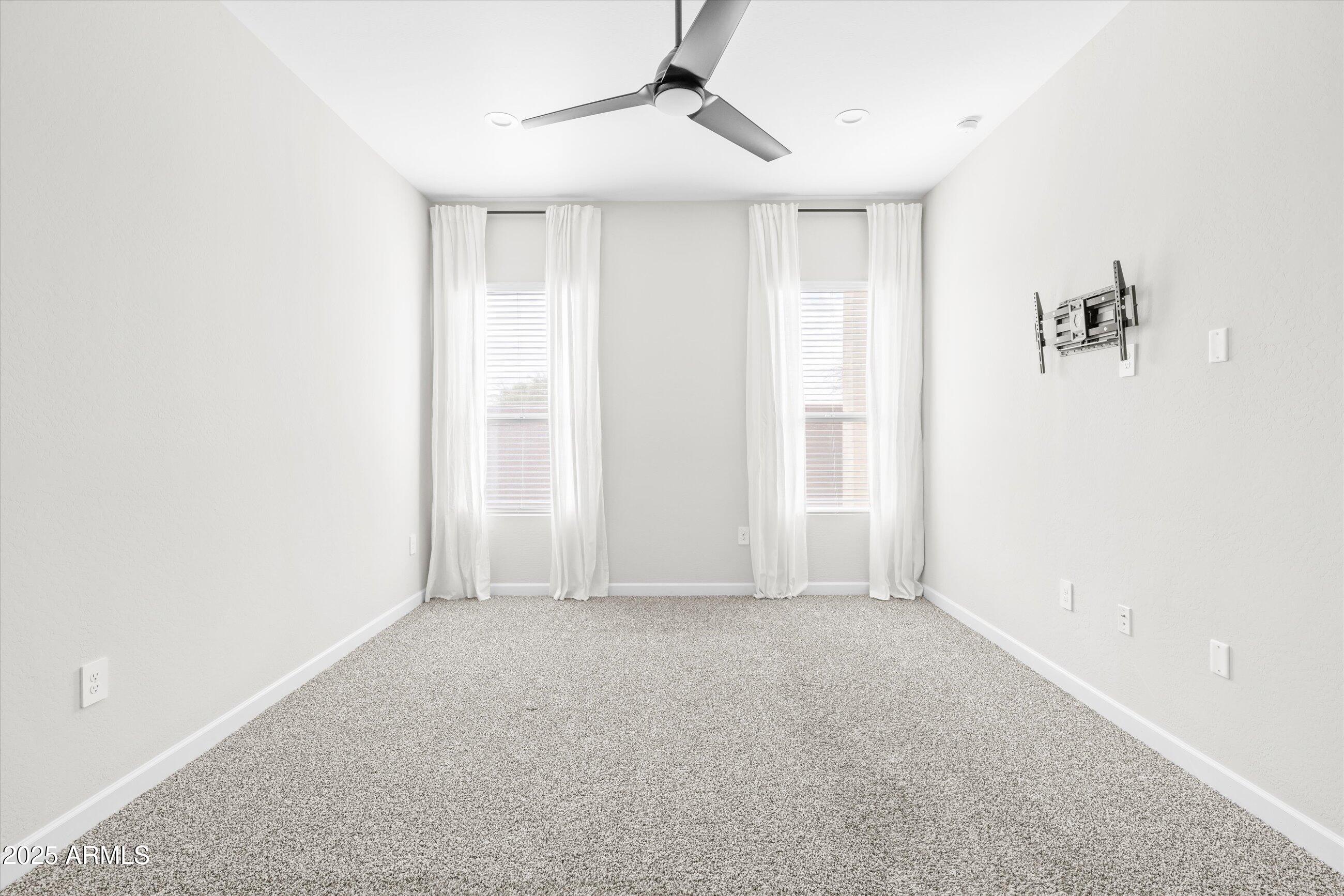 21425 North 59th Street Phoenix, AZ 85054 - Photo 21 of 47 a view of an empty room with a window