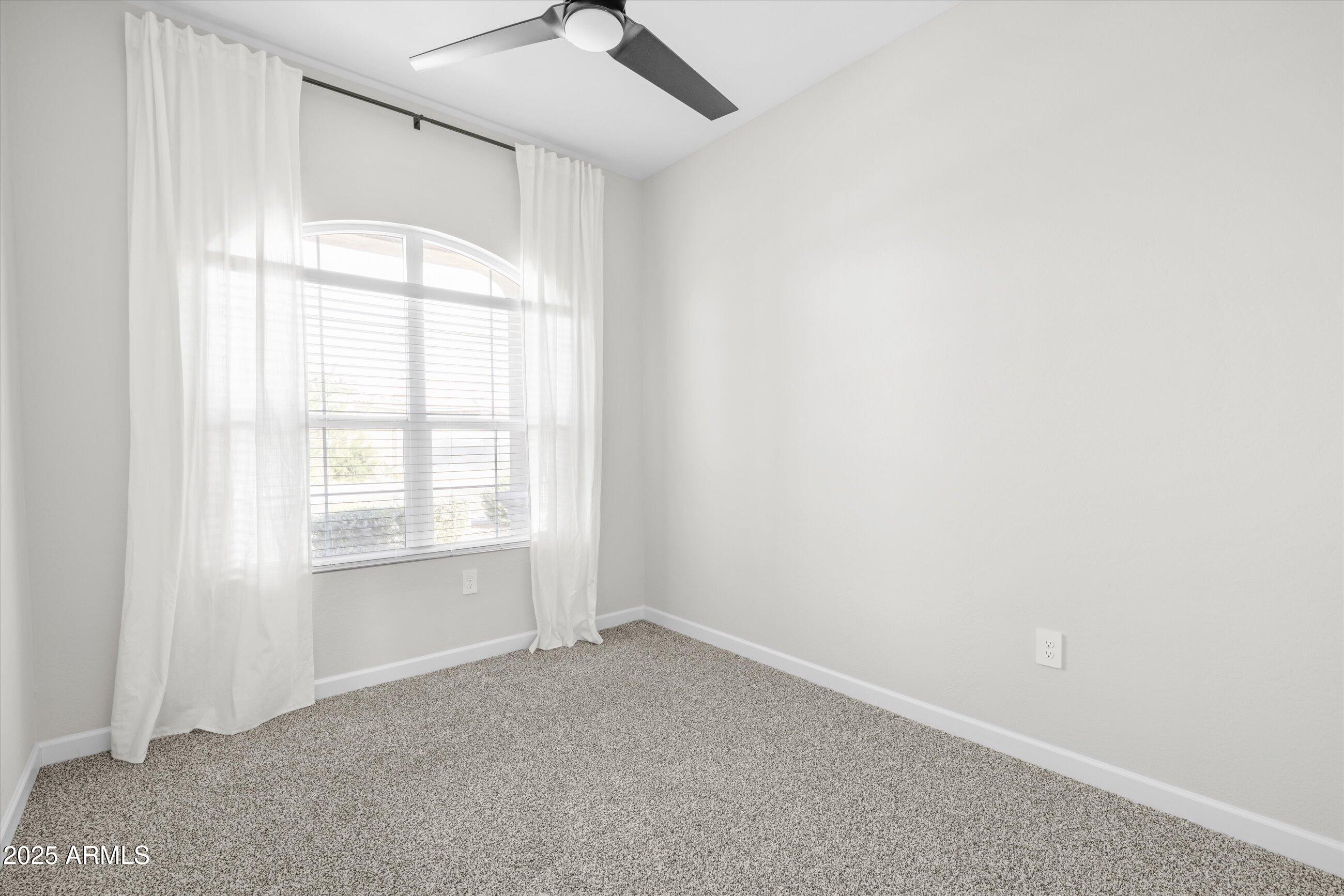 21425 North 59th Street Phoenix, AZ 85054 - Photo 28 of 47 an empty room with a empty space and windows