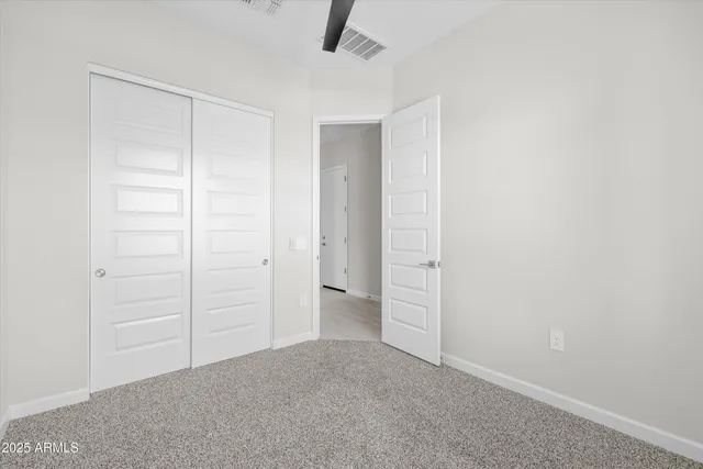 an empty room with closet