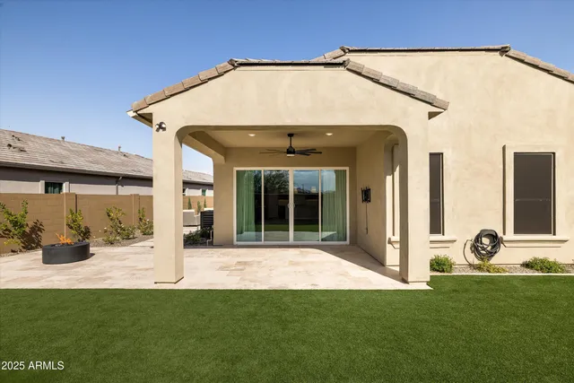 a view of a swimming pool with a patio