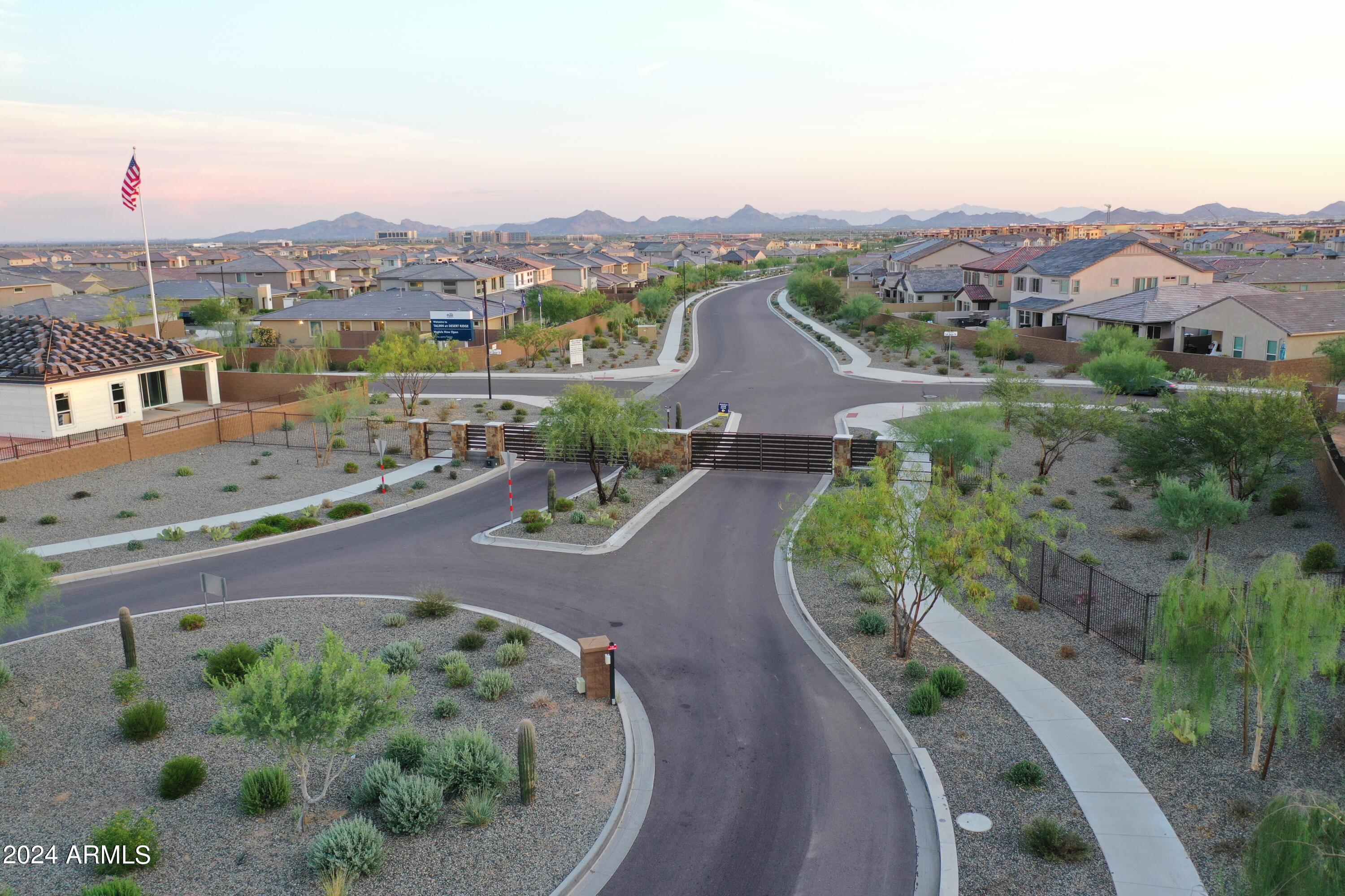 21425 North 59th Street Phoenix, AZ 85054 - Photo 42 of 47 an aerial view of a house with a garden and mountain view