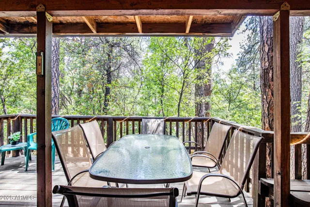 a view of balcony with furniture