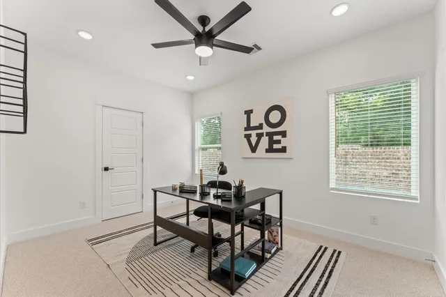 a bathroom with a double vanity sink toilet mirror and shower