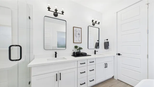 a spacious bedroom with a bed and a large window