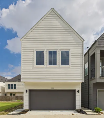 a sign that is in front of a house