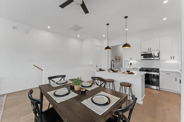 a kitchen with a sink and a refrigerator