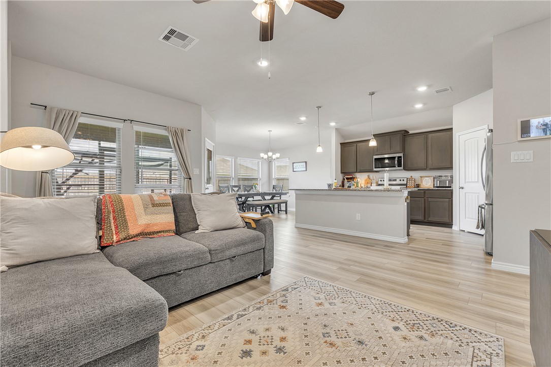 2016 Chief Street Bryan, TX 77807 - Photo 6 of 30 a living room with furniture and kitchen view