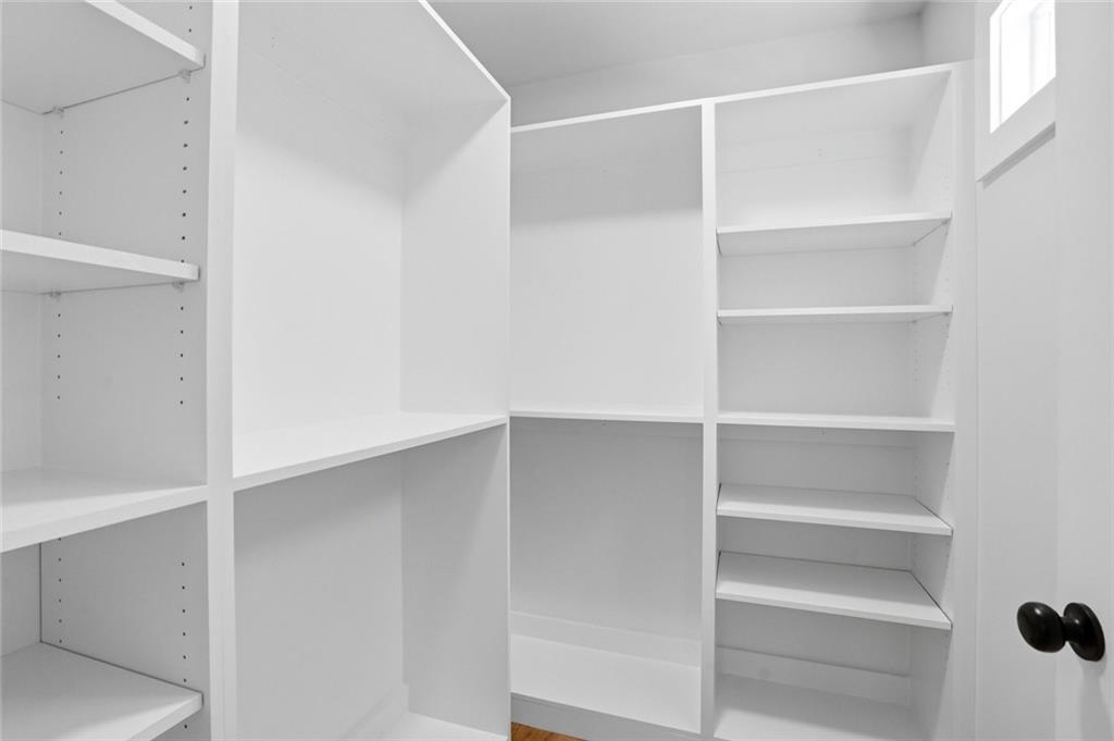 134 Henry Meyer Road Winterville, GA 30683 - Photo 20 of 34 a view of walk in closet with empty racks